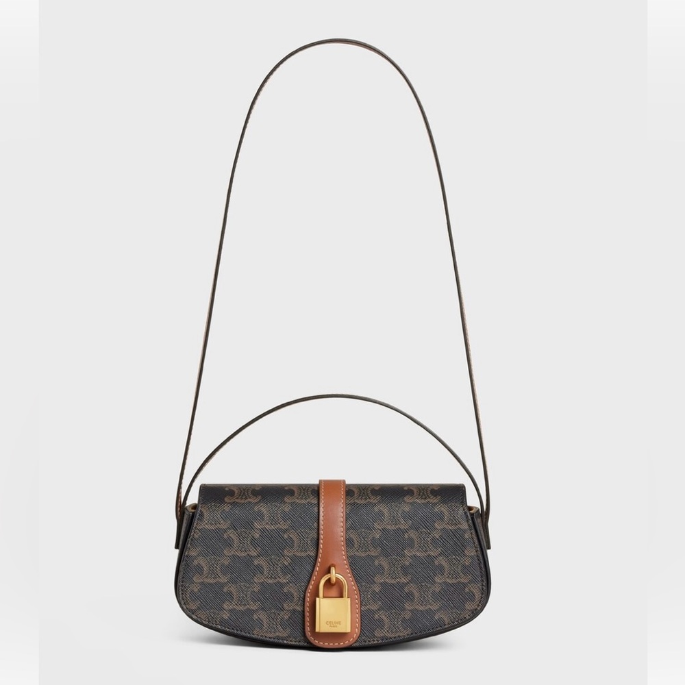 CELINE CLUTCH ON STRAP TABOU IN TRIOMPHE CANVAS AND CALFSKIN
